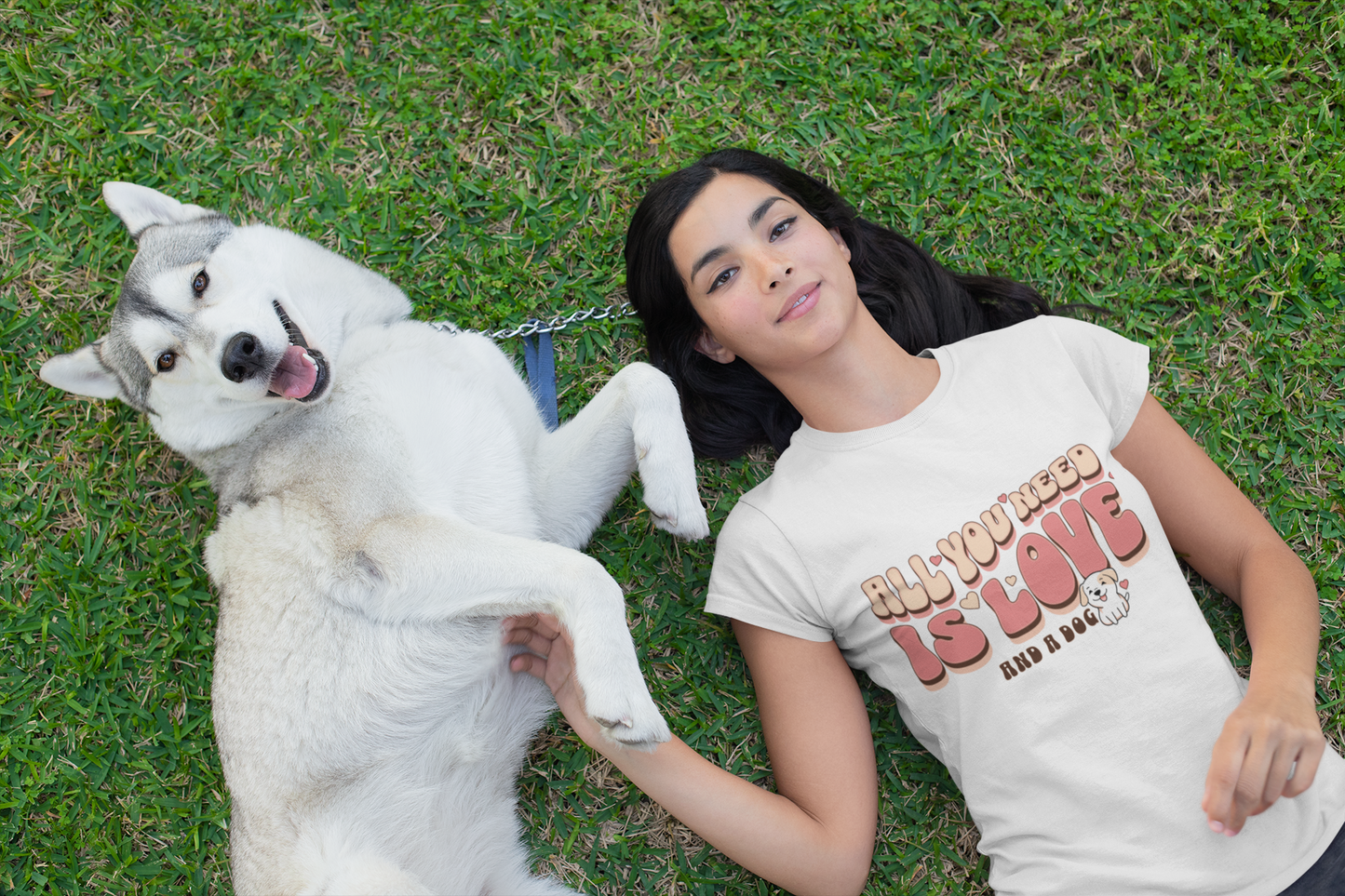 Woman posing with her cute dog wearing dog mom tshirt